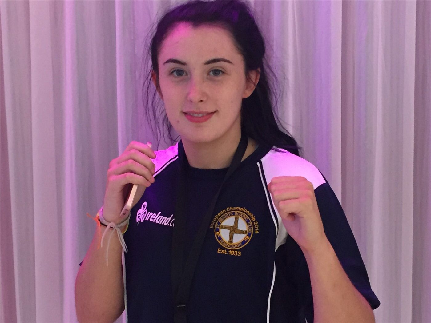 An Edenderry boxer in an Ireland vest bearing the St Brigid's club crest
